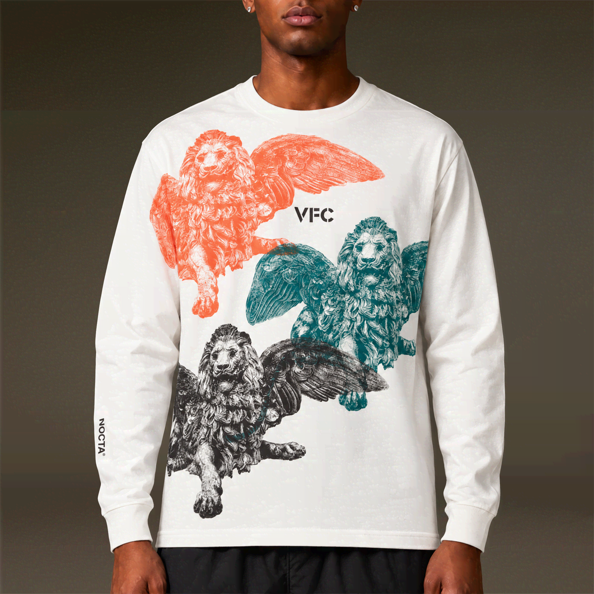 26/27 VFC Travel Lion Statue Tee – Long Sleeves